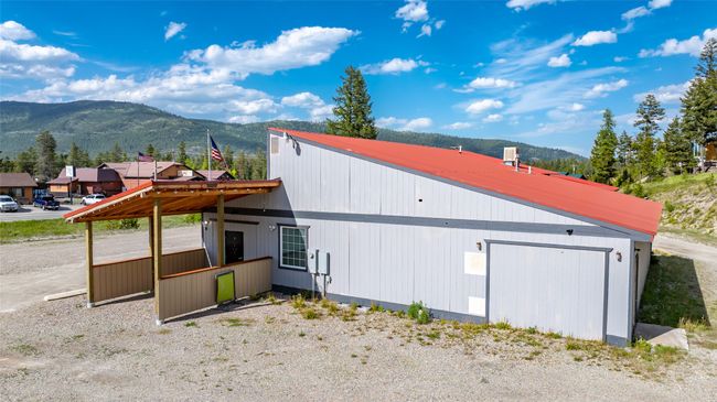 View of side of home with a mountain view | Image 98