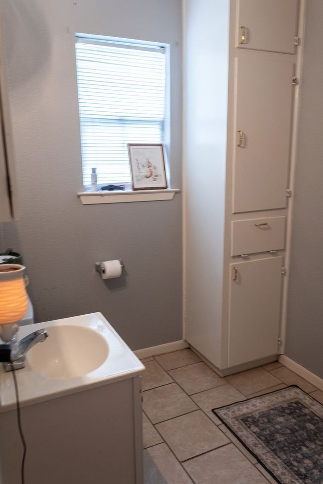 Bathroom with vanity and tile patterned flooring | Image 22
