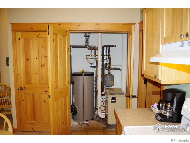 2-zone natural gas hot water baseboard heat and hot water heater. | Image 12