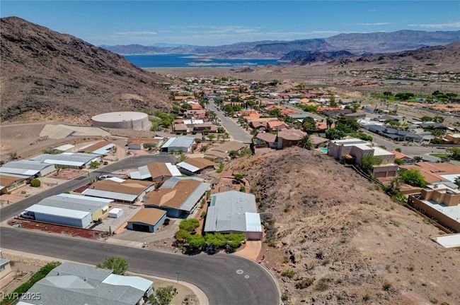 Aerial view of residential area with mountains | Image 68