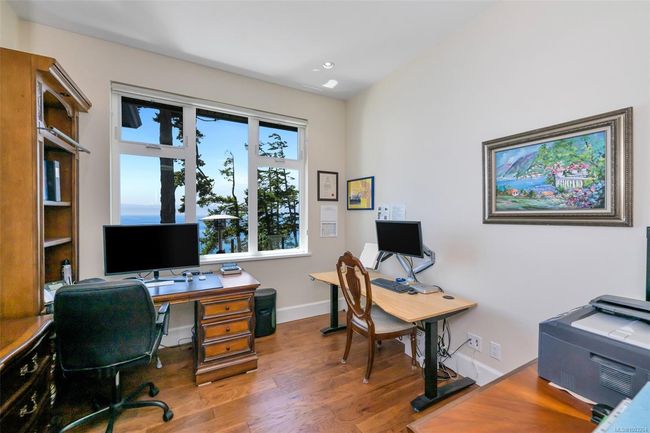 Home office with wood finished floors and recessed lighting | Image 78