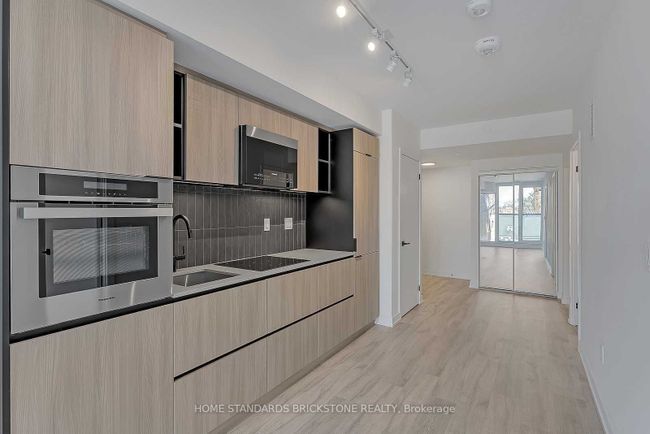 310 - 2 Augusta Ave, Condo with 1 bedrooms, 2 bathrooms and null parking in Toronto ON | Image 11