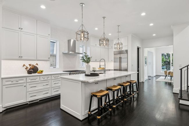 Subzero Wolf Gas Range Kitchen. Calcutta Marble, Custom Cabinetry. | Image 6