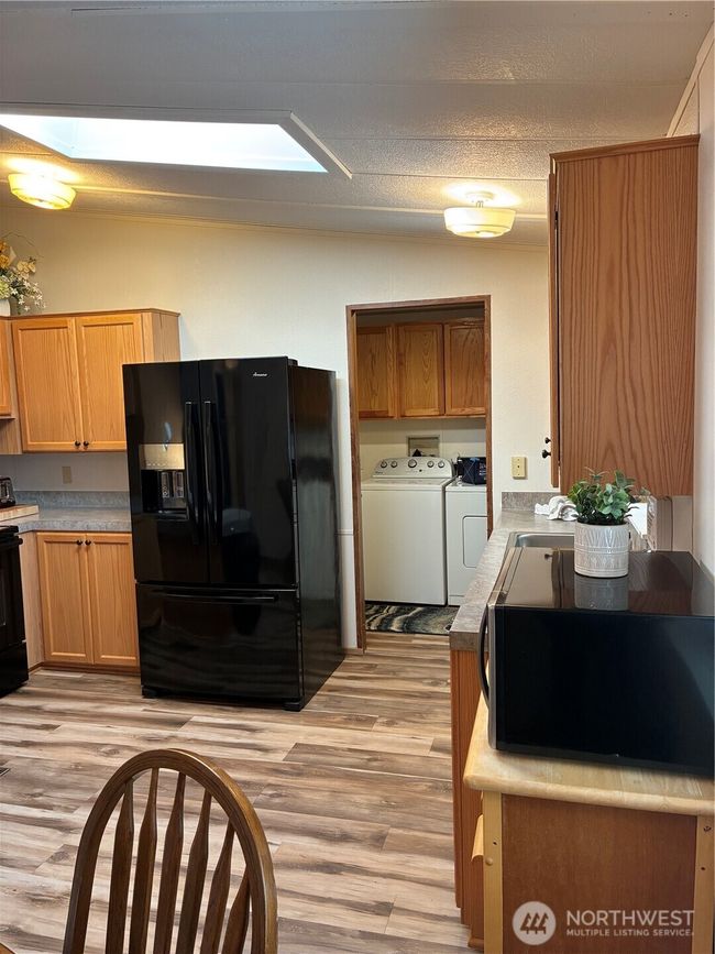 Kitchen off Back Entrance from Carport | Image 11