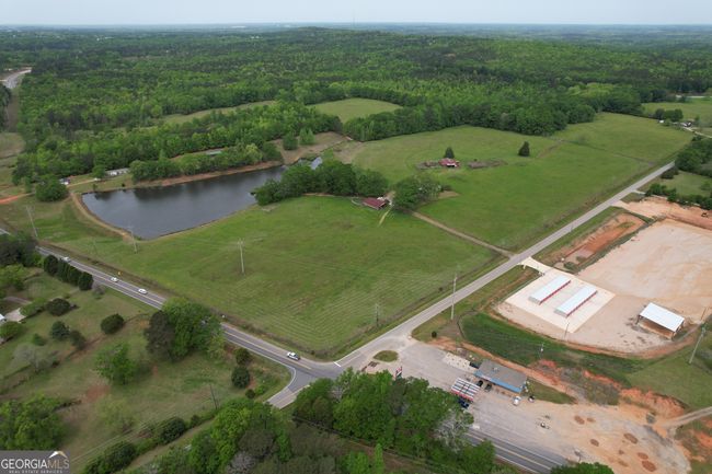 387 Fredonia Church Rd, Home with 3 bedrooms, 2 bathrooms and 2 parking in BARNESVILLE GA | Image 4