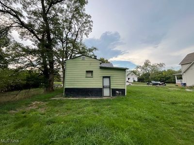 Back of house featuring a lawn | Image 3