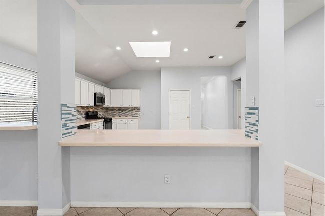 1030 Evandale Ln, House other with 4 bedrooms, 2 bathrooms and 2 parking in Sugar Land TX | Image 9