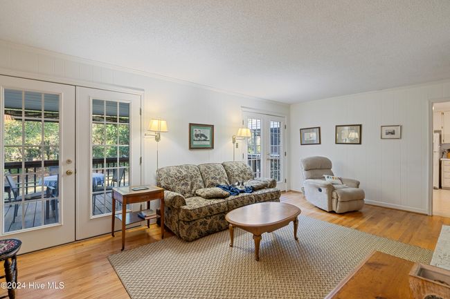 Den with Double Doors to Porch | Image 9