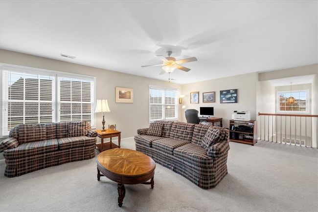 The spacious 22x15 bonus room with additional oversized hallway is an ideal space for guests or allows for the upstairs man cave or home office. | Image 28