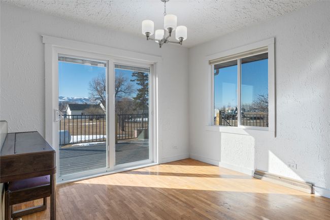 Direct access to the outdoor deck from the dining area. | Image 34