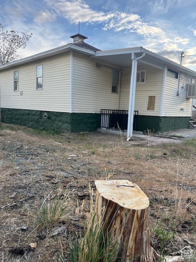 Back of home, side yard and basement entry | Image 22