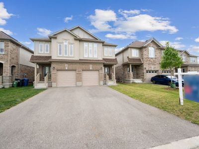 63 John Brabson Cres, Home with 4 bedrooms, 3 bathrooms and 3 parking in Guelph ON | Image 1