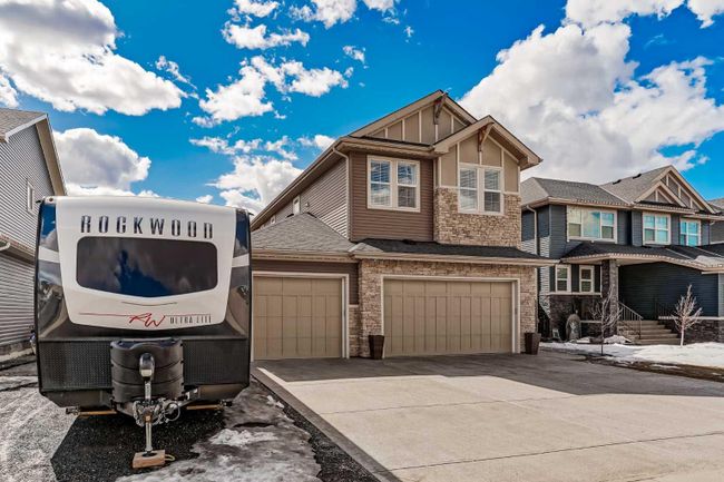 548 Boulder Creek Bay Se, Home with 4 bedrooms, 3 bathrooms and 6 parking in Langdon AB | Image 2