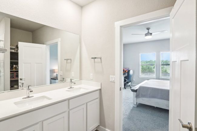 Primary bathroom with dual vanities | Image 19