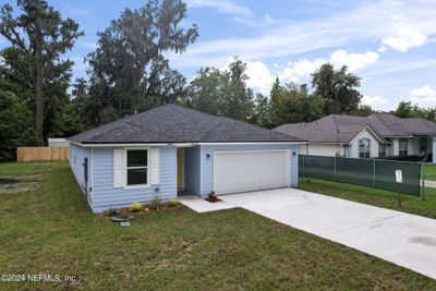 1014 Floyd Street, House other with 4 bedrooms, 2 bathrooms and null parking in Fleming Island FL | Image 1