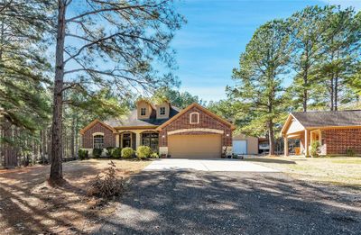 Front view of the house and the side She Shed, work room or??? | Image 1