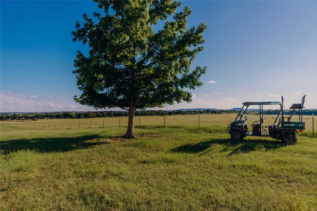 View of yard with a view of countryside | Image 32