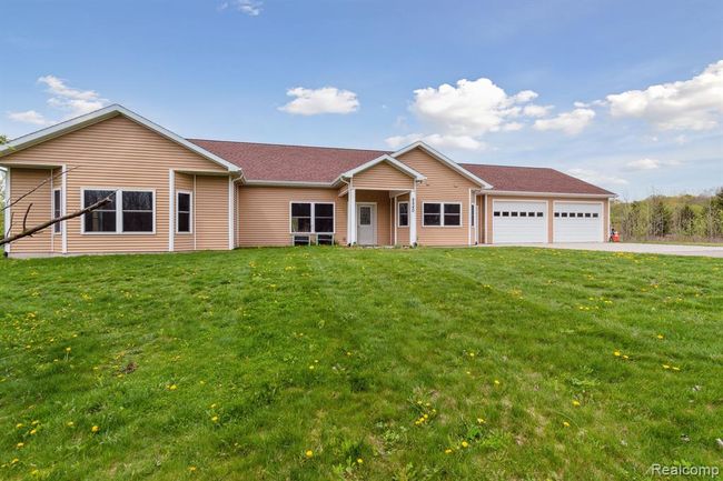 8840 S Garlock Road, House other with 4 bedrooms, 2 bathrooms and null parking in Bloomer Twp MI | Image 2
