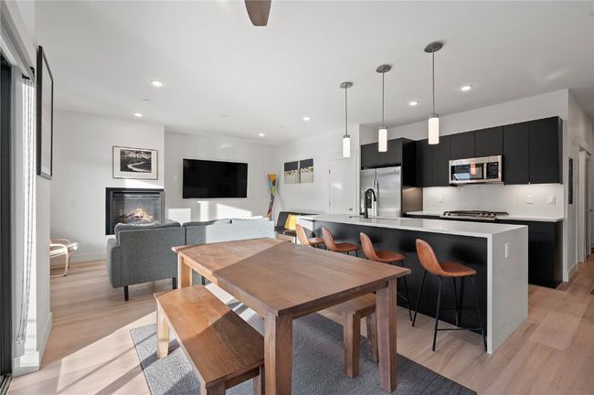 Dining room featuring light wood-type flooring | Image 14