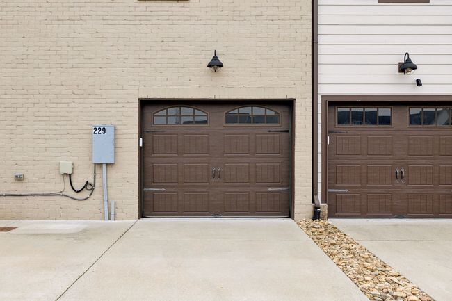 Enough parking for two cars and a one car garage. | Image 31