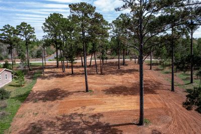 Looking out to the front of property and roadside, perfect site is lighter dirt and 3x5 rock base | Image 2