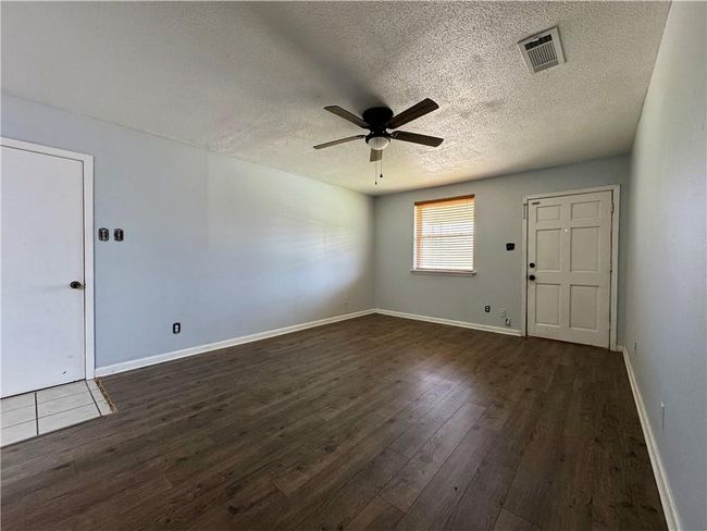 The living room measures 17' x 12' +/- | Image 6