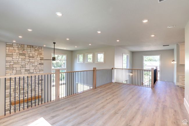 Unfurnished room with wood finished floors and recessed lighting | Image 18
