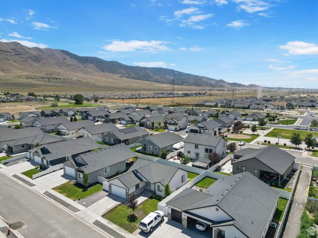 Aerial perspective of suburban area featuring a mountainous background | Image 32