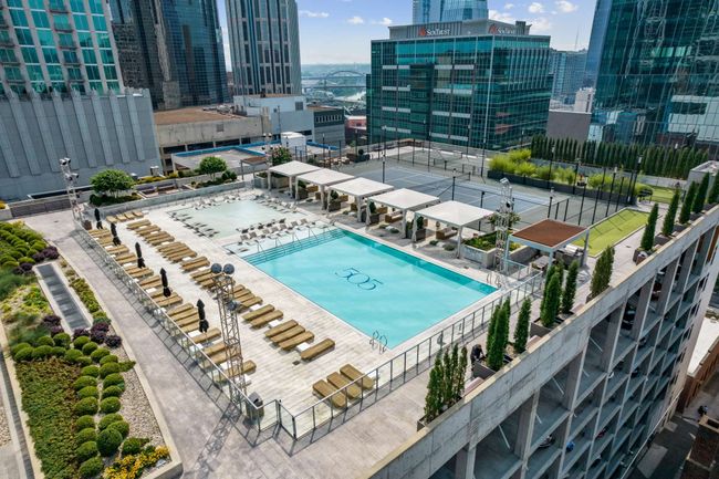 Step outside to discover the beautifully landscaped outdoor space, allowing you to relax and unwind while overlooking the city. | Image 54