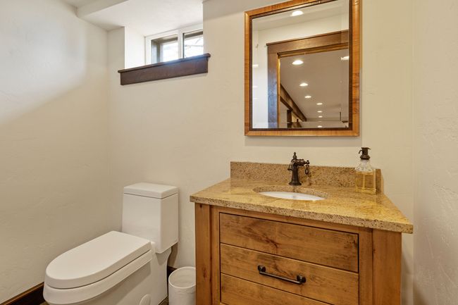 Half bathroom with toilet and vanity | Image 61