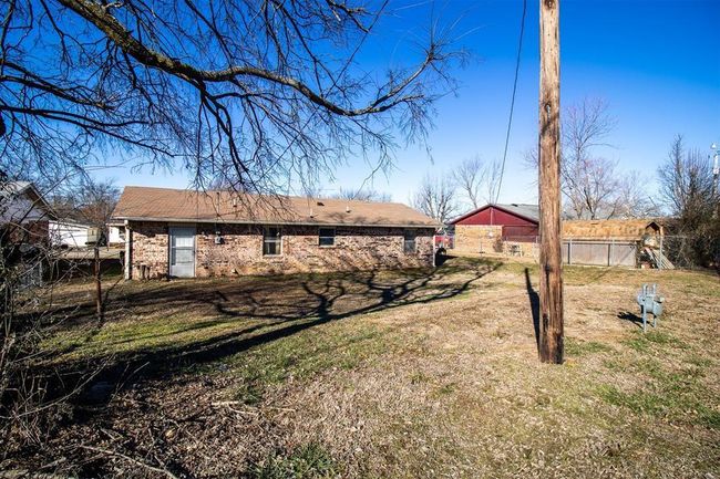 Rear view of house with brick siding | Image 8