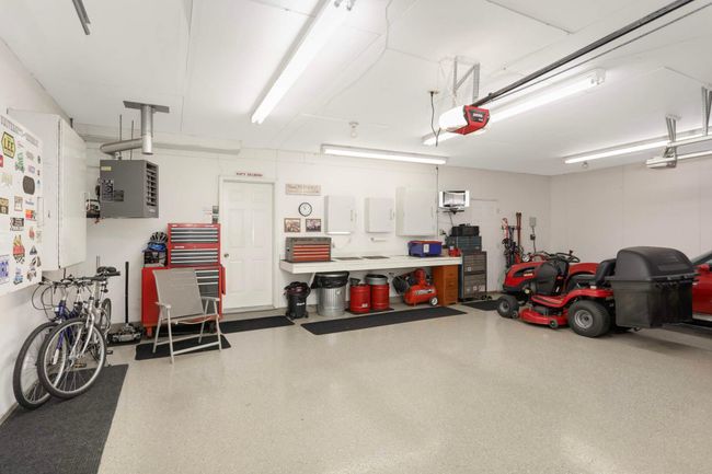Garage with epoxy flooring. | Image 7
