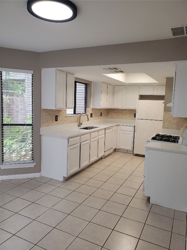 A - 9008 Sanger Dr, Home with 2 bedrooms, 3 bathrooms and 1 parking in Austin TX | Image 9
