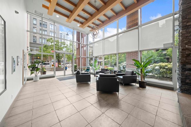 Community lobby featuring a towering ceiling, beam ceiling, coffered ceiling, and floor to ceiling windows | Image 23
