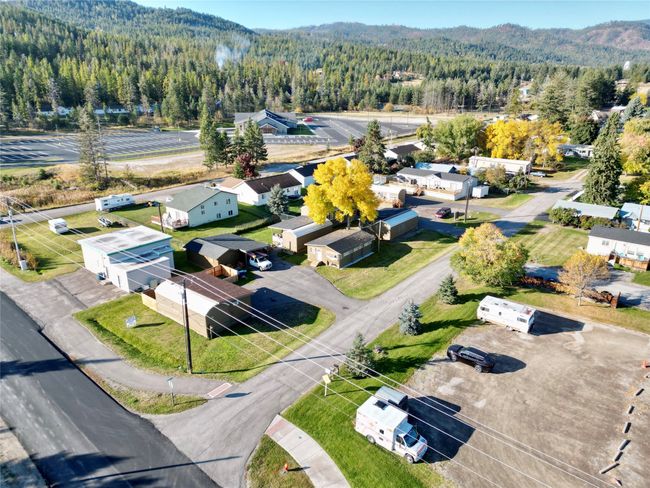 Bird's eye view featuring a forest view | Image 10