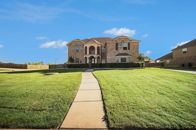French country home featuring stone siding | Image 5