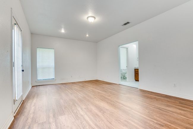 Spare room with light wood-type flooring and recessed lighting | Image 12