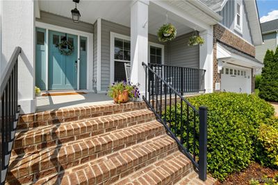 Doorway to property featuring covered porch | Image 3