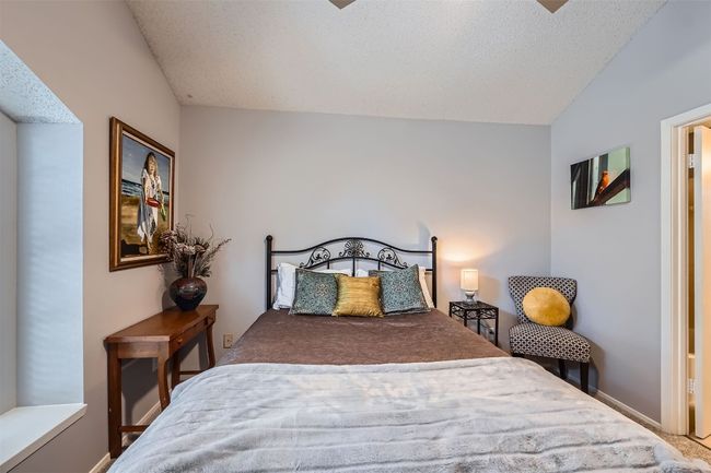 Bedroom 2 is spacious with large closet. | Image 14