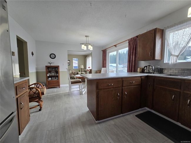 7071 Mc Dougal Pl, House other with 4 bedrooms, 3 bathrooms and 2 parking in Port Hardy BC | Image 7