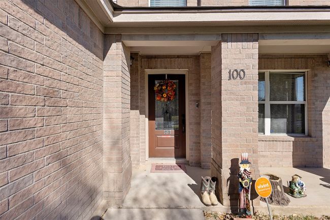 Property entrance with brick siding | Image 6