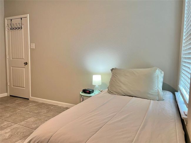 Discover this inviting home with 4 spacious bedrooms and 2 full baths, perfect for comfortable living. | Image 16