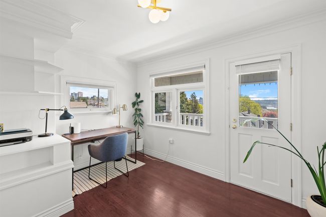 Office space with baseboards, ornamental molding, and wood finished floors | Image 24
