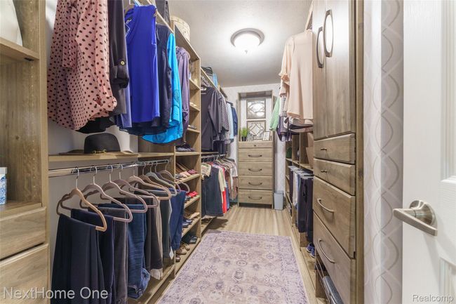 Custom primary closet w/plenty of storage | Image 5