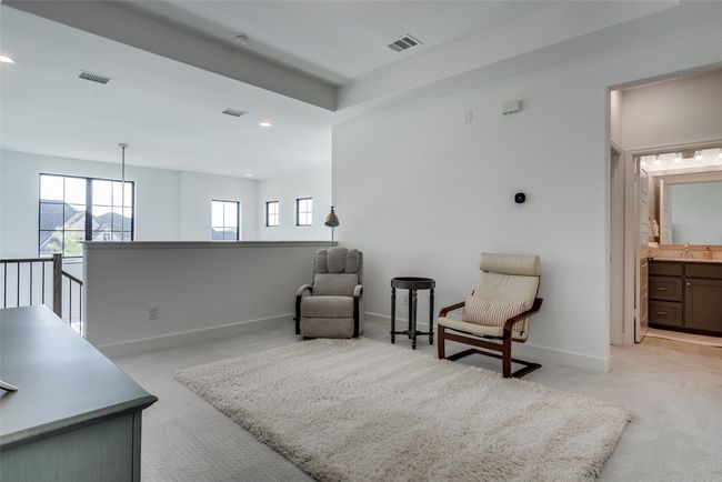Upstairs Sitting room with light colored carpet, recessed lighting, and an upstairs landing | Image 8