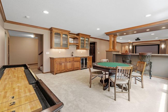 Sellers finished the basement, and recently added new carpet, flooring, and paint in the bathroom. | Image 30