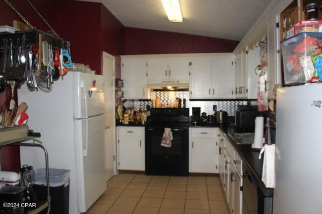 25676 Ne Evans St, House other with 3 bedrooms, 2 bathrooms and null parking in Altha FL | Image 23