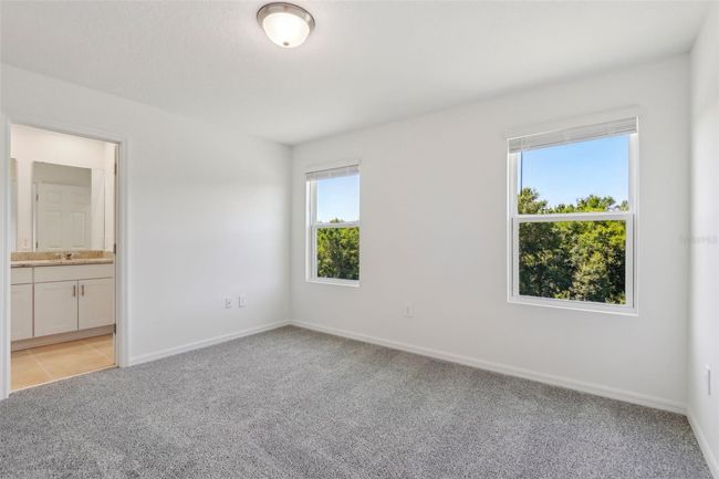 16419 Bird Of Paradise Ave, Townhouse with 3 bedrooms, 3 bathrooms and null parking in CLERMONT FL | Image 28