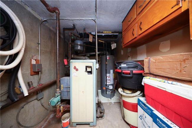 Utility room with water heater | Image 29