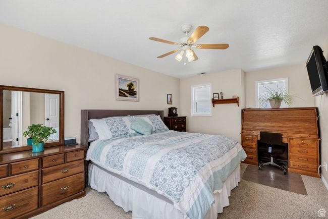 Master Bedroom with a desk and a ceiling fan | Image 9